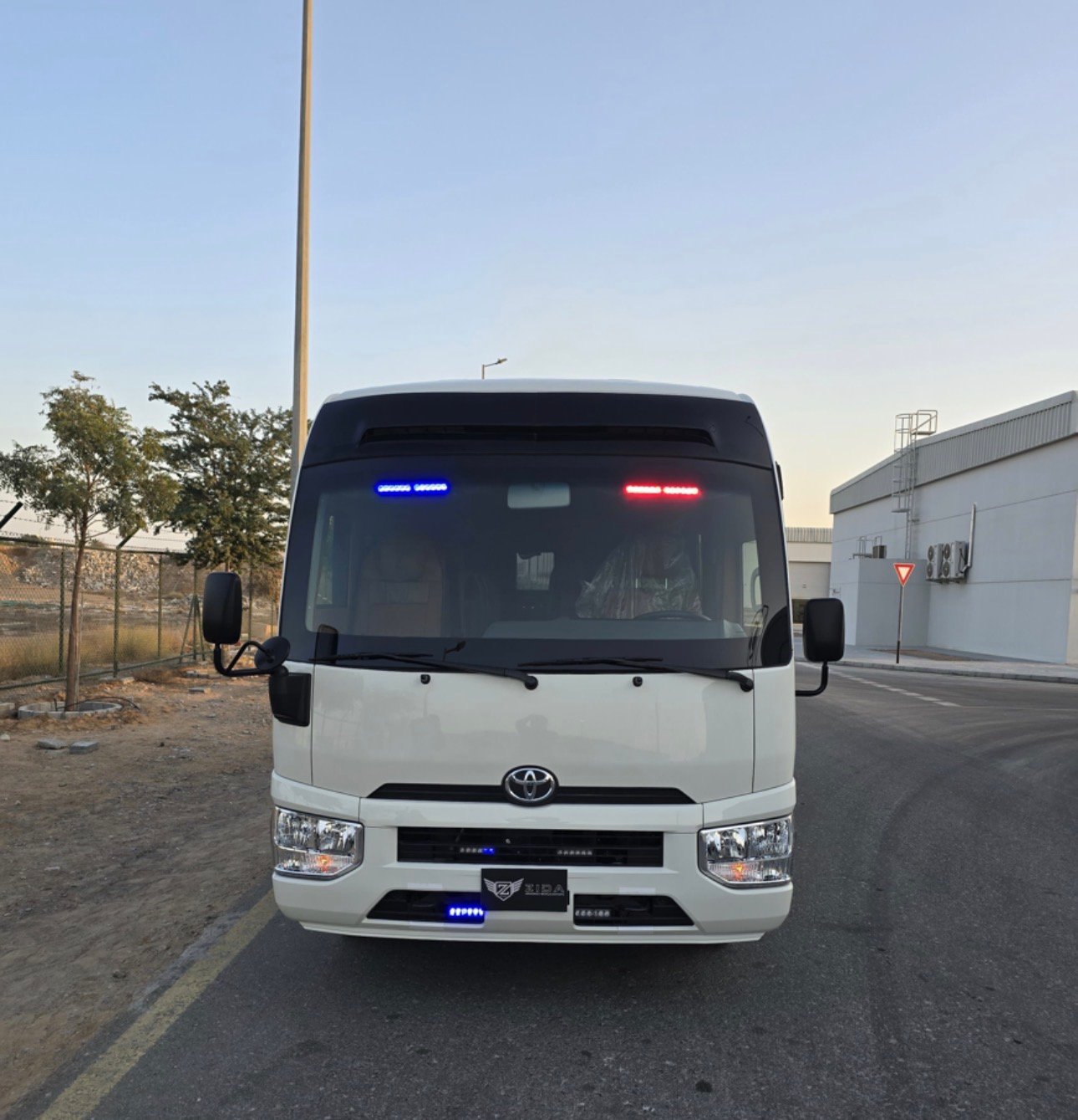 2025 Toyota Coaster bus Bus — Side profile